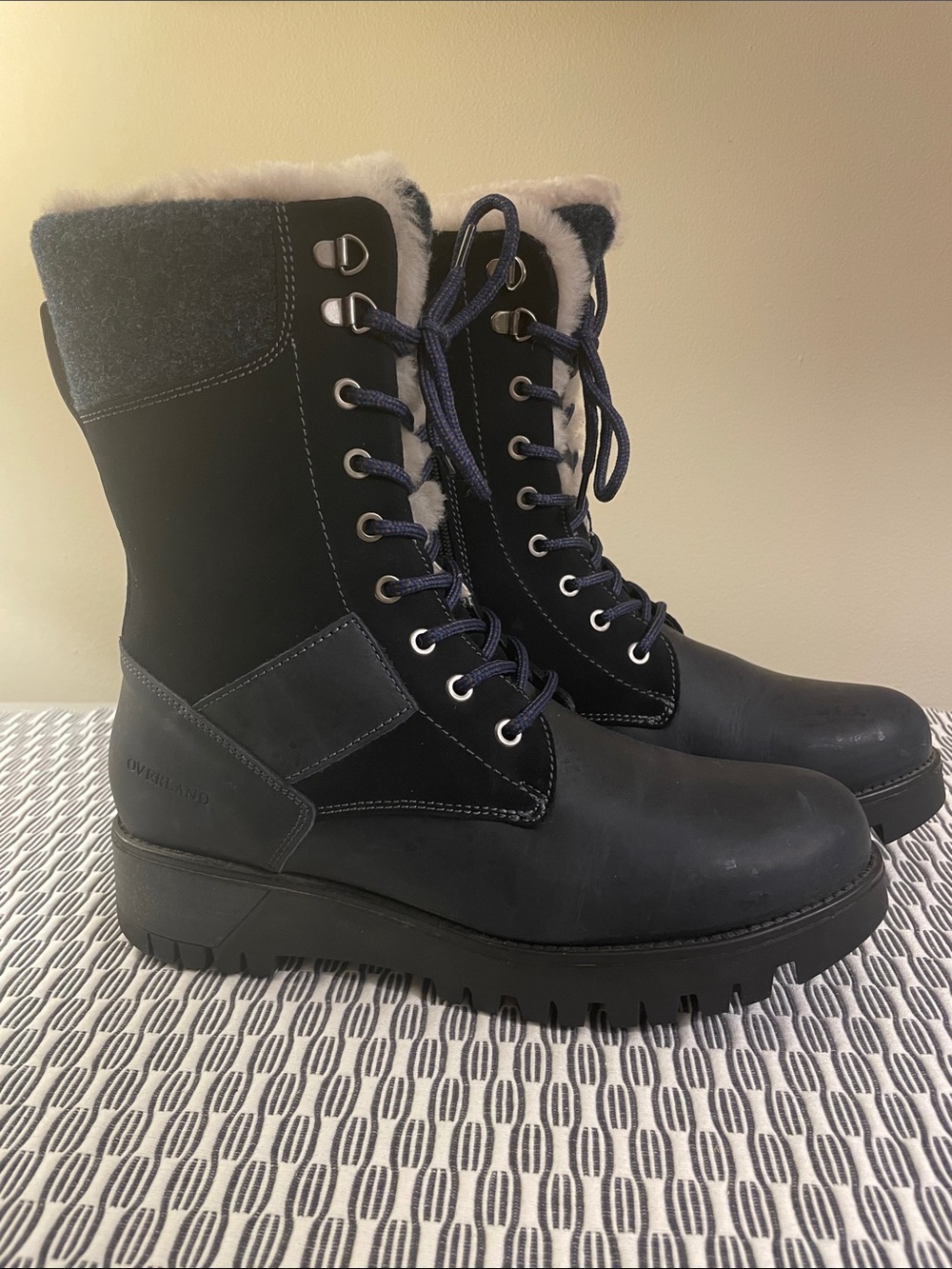 Women’s Navy shearling lined cold weather boots.